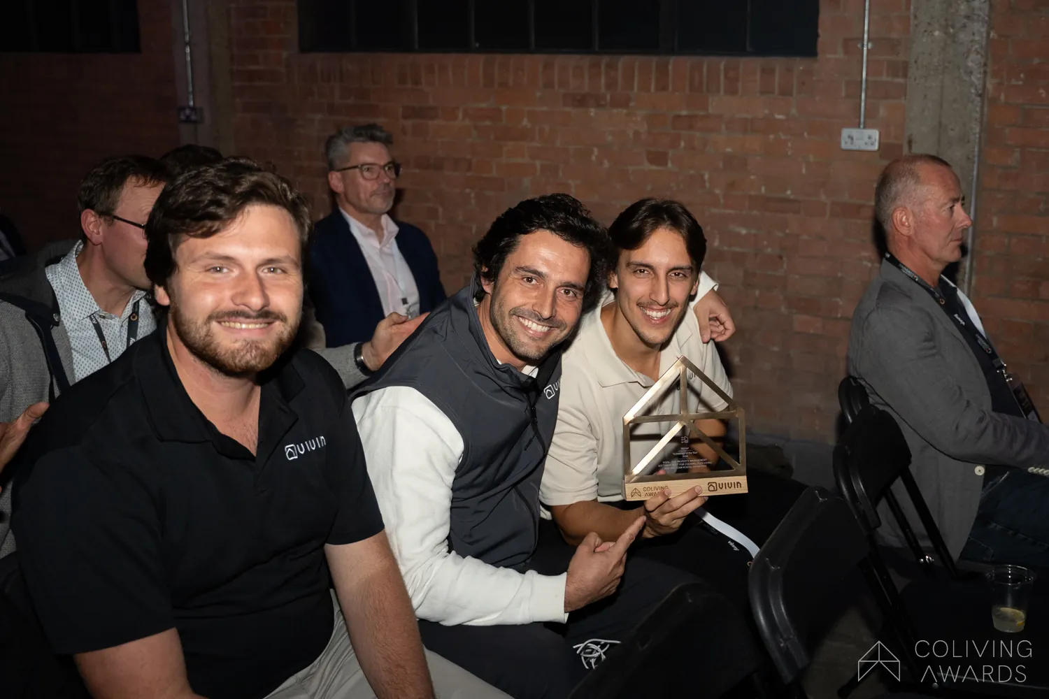 The Vivin team at the ceremony, trophy in hand